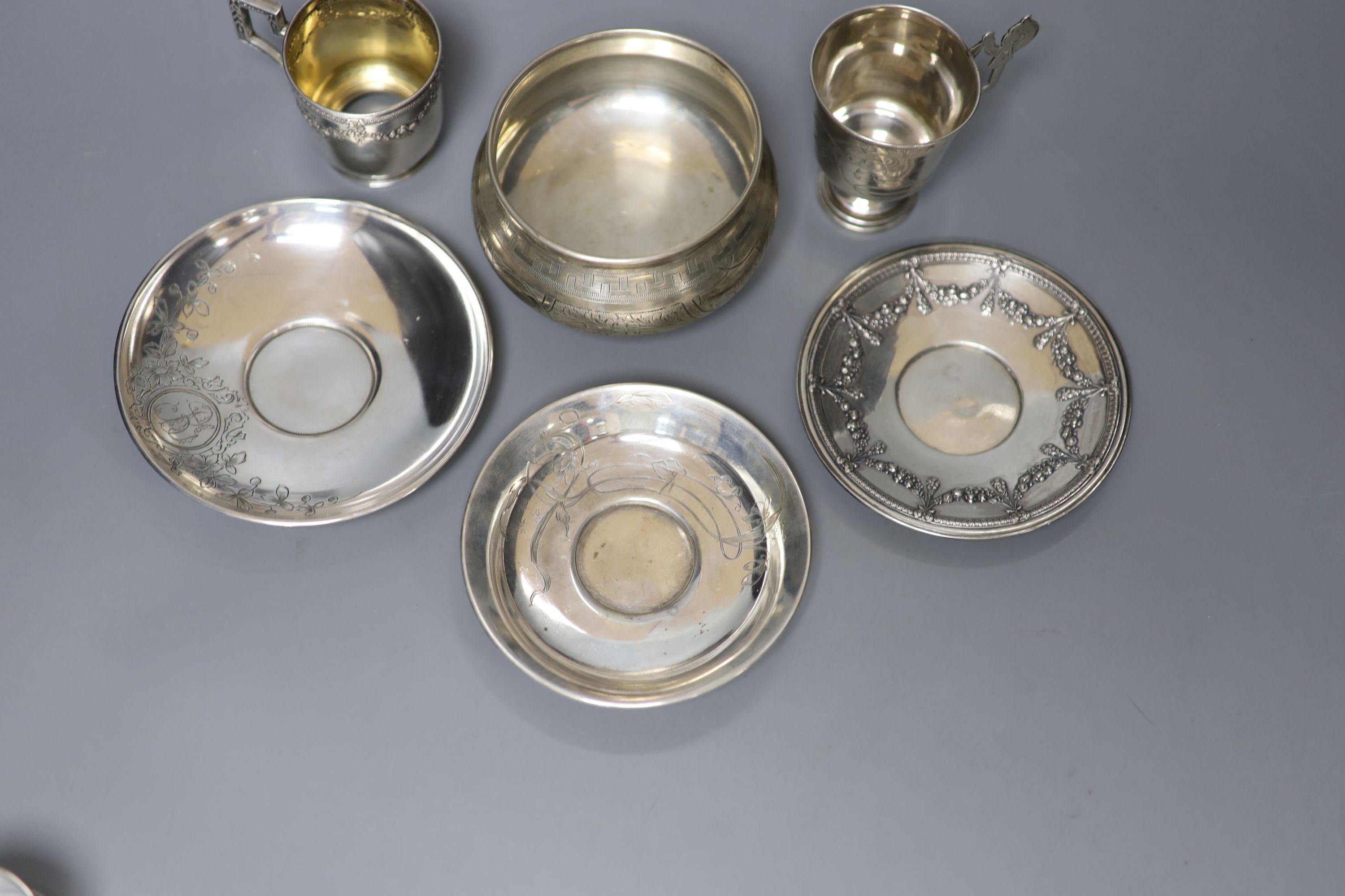 Two early 20th century Russian 84 zolotnik cups and saucers, one other saucer, napkin ring and sugar bowl